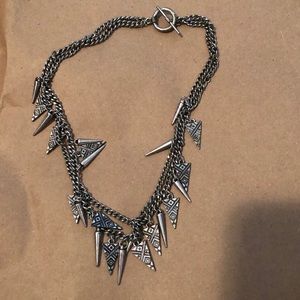 Silver necklace with arrows